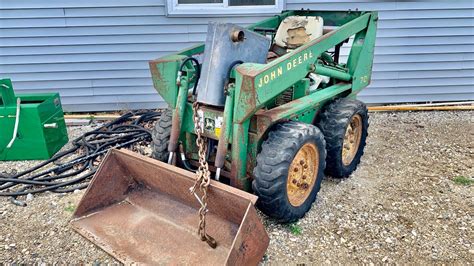 tension track john deere skid steer|how to unstick track tensioners.